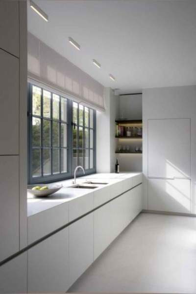 Natural light makes the kitchen look visually larger and spacious
